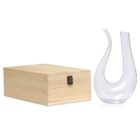 A clear, curved glass decanter stands beside a closed wooden box with a metal latch, placed against a plain white background.
