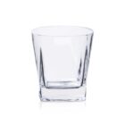 A clear, empty glass tumbler with a thick base, against a white background.