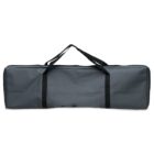 A long, rectangular black carrying bag with two handles, resting against a white background. The bag appears empty and closed.