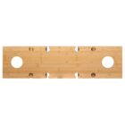 A rectangular wooden board with two large circular cutouts on either end and several smaller notches along the sides. The board has a smooth, natural finish and appears to be made of light-colored wood, potentially bamboo.