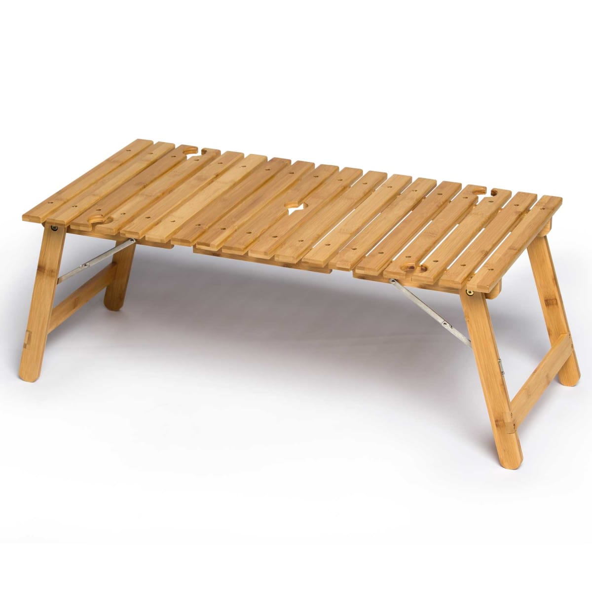 A wooden folding coffee table with slatted design and angled legs is set against a plain white background. The table appears lightweight and portable, suitable for outdoor use or picnic settings.