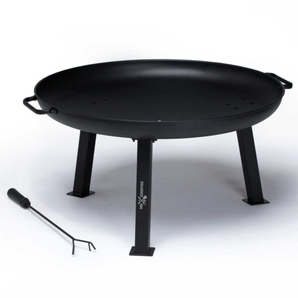 A black metal fire pit with a round bowl supported by three sturdy legs is shown. It comes with a poker tool placed next to it on the white surface. The design is simple and modern, suitable for outdoor use.