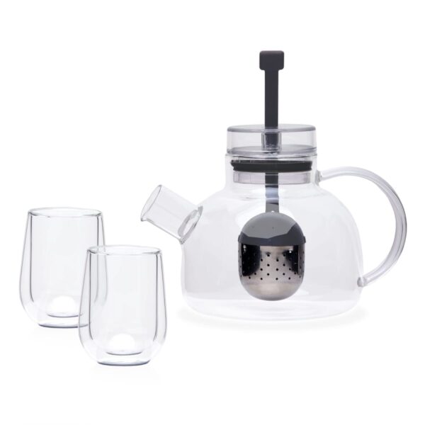 A clear glass teapot with an attached tea infuser and lid is displayed alongside two matching glass cups. The teapot has a curved handle and spout, and the infuser is suspended from the lid. The set is arranged on a plain background.