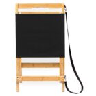 A foldable wooden chair with a black canvas seat and backrest. The chair has a black strap attached for easy carrying.