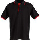 A black polo shirt with short sleeves and a collar. It features red trim on the collar and sleeve edges, and a red button placket. The shirt is displayed against a plain white background.