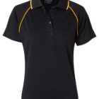 Black womens polo shirt with short sleeves and a collar featuring orange piping along the shoulder seams. There are three buttons on the placket beneath the collar.