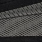 Close-up of black and gray fabric with a diagonal pattern and tiny holes.