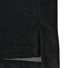 Close-up of the hem and side slit of a black textured fabric garment.