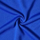Close-up of blue textured fabric swirled at the center.