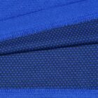 Close-up of textured blue fabric with zigzag stitches.