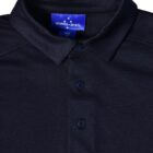 Black polo shirt with three buttons, folded collar, and a blue label inside.