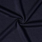 Close-up of dark blue textured fabric swirled in the center.