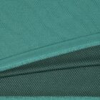 Close-up of layered green fabric with a textured and dotted underside.