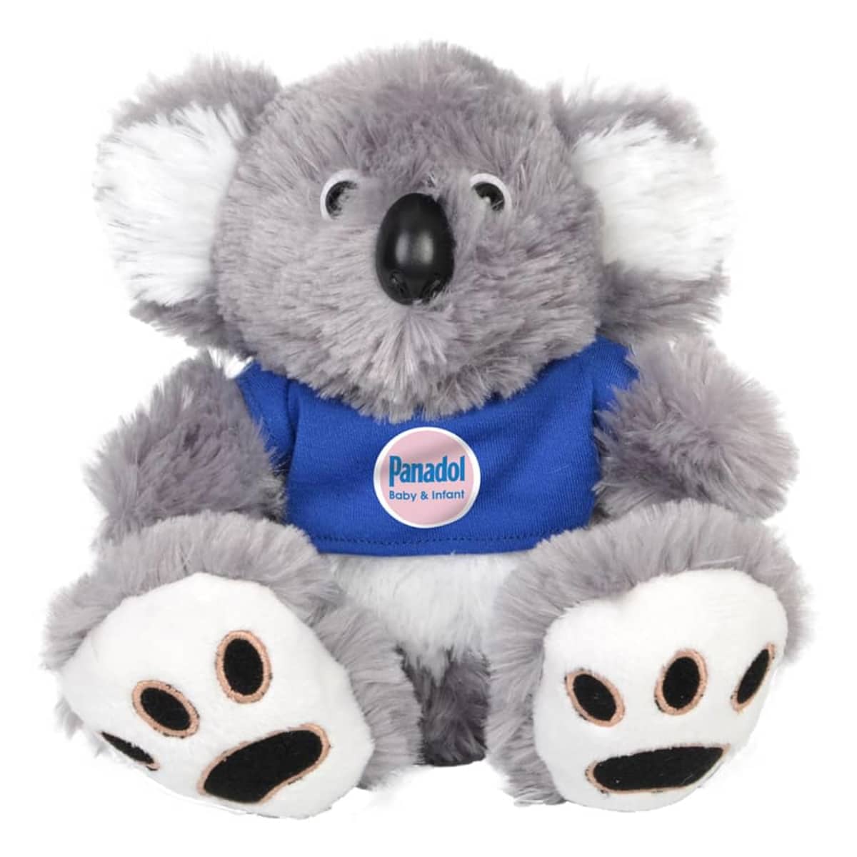 A fluffy gray koala bear plush toy with white ears and a black nose. It wears a blue shirt with a Panadol Baby & Infant logo on its chest. The feet have black paw prints.