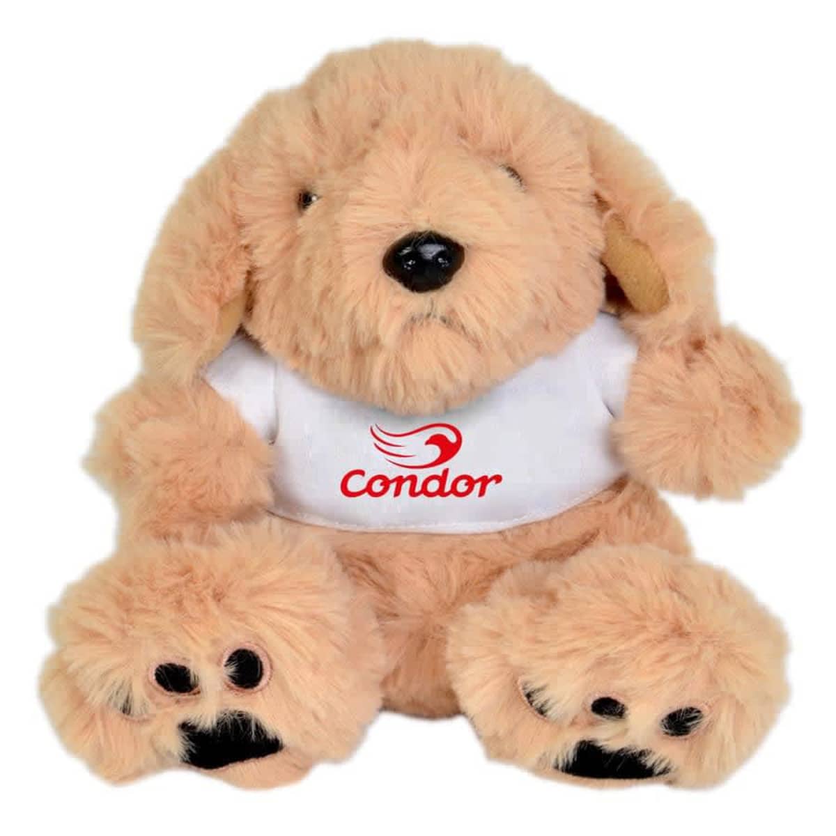 A fluffy beige stuffed animal dog with floppy ears and black nose, wearing a white shirt displaying the red logo and text Condor. The dogs paws are visible, with black pads contrasted against the light fur.