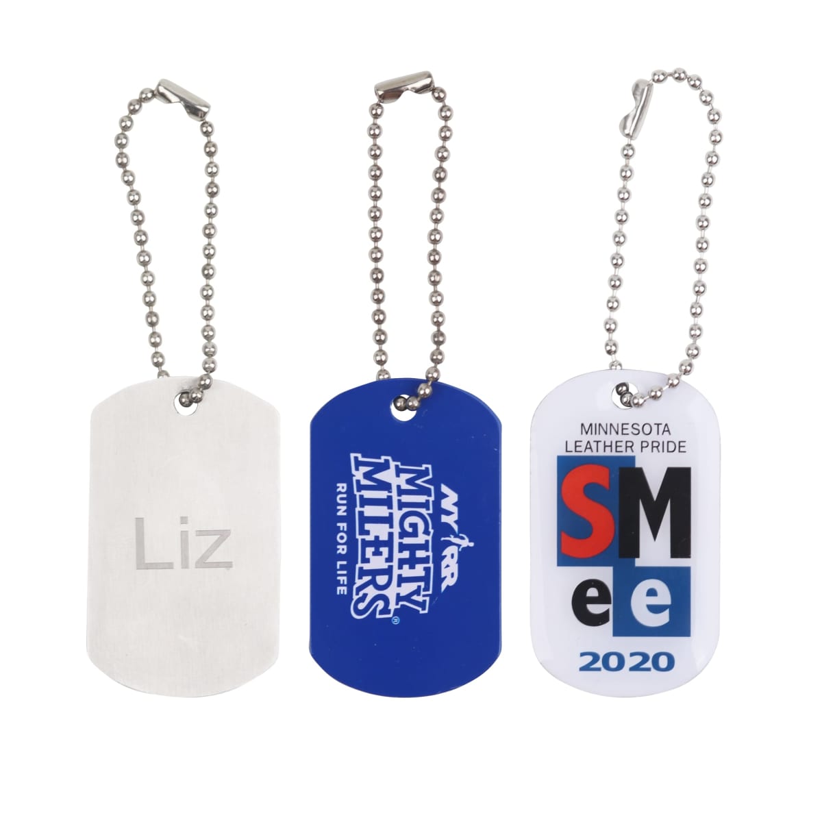 Three dog tags on beaded chains. The first is silver with Liz engraved. The second is blue with Mighty Milers Run for Life. The third is white with Minnesota Leather Pride SM 2020 in colorful text.