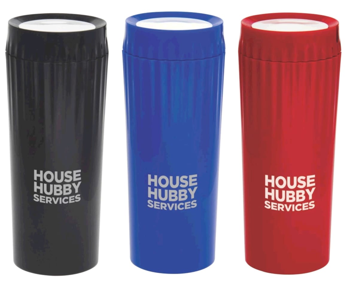 Three travel mugs are displayed in a row. The mugs are black, blue, and red, each with the text House Hubby Services printed in white.