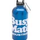 A blue metal water bottle with a black cap and silver carabiner attached. The words Busy Mate INDUSTRIES are printed in large white letters on the bottles side.