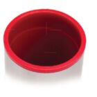 A white cylindrical container with a red interior and rim, viewed from above.