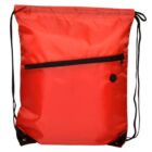 A bright red drawstring backpack with black strings. It features a front zippered pocket and a small circular button near the pockets edge. The corners are reinforced with black grommets for added durability.