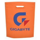 An orange tote bag with a cutout handle features the blue and red Gigabyte logo. The logo consists of a stylized G and a red triangle, with the word GIGABYTE written below in blue.