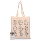 A beige tote bag with black cartoon animal outlines for coloring. Twelve animals are shown, including a lion, elephant, hippopotamus, pig, and zebra. A box of colored crayons is next to the bag.