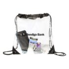 A clear drawstring bag with Bendigo Bank printed on it contains a phone, a blue notebook, a tube of sunscreen labeled SPF 50+, a purple packet, and two other small items. The bag has black corners and strings.