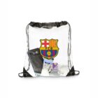 A clear drawstring bag with a black cord, featuring the FC Barcelona logo. The bag contains a smartphone, a tube of Sport sign lotion, a purple rectangular item, and a pair of sunglasses with a white case.