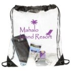 A transparent drawstring bag displays various items: a smartphone, a tube of Neutrogena sunscreen, a purple wristband, and a silver card holder. The bag is labeled with Mahalo Island Resort in purple, featuring a palm tree and beach chair logo.