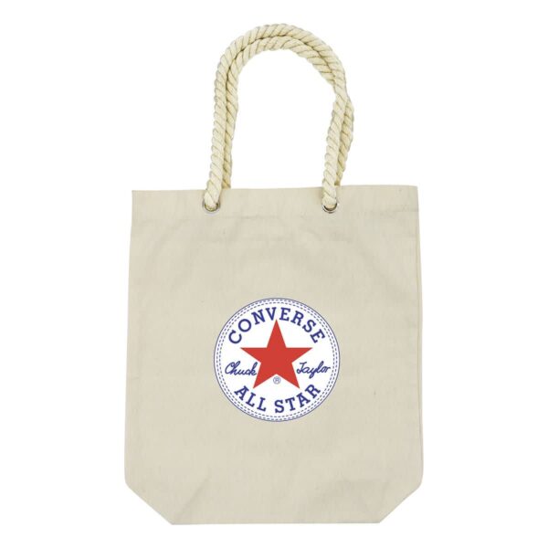 A beige canvas tote bag with thick rope handles. The front features a circular Converse All Star logo with Chuck Taylor written inside, surrounding a red star.