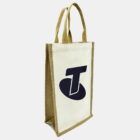 A beige tote bag with a reinforced burlap edge and two handles. It features a large, stylized T logo in dark blue on the front. The background is plain white.
