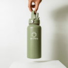 A hand holds a green water bottle featuring the Android logo against a plain white background. The bottle has a flip-top lid and a sturdy handle.