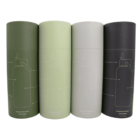 Four cylindrical insulated drink bottles in various shades of green, gray, and black are lined up. Each bottle has a minimalist outline of a bottle design on its surface and holds 1 liter (34 oz).