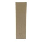 A tall, plain cardboard box standing upright. The box features a simple outline drawing of a water bottle along with the text Classic Water Bottle 32oz / 1L near the bottom. The background is plain white.