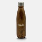 A stainless steel water bottle with a wood grain finish. The bottle has a silver cap and is labeled dusk in white lettering on the front. It is set against a plain white background.