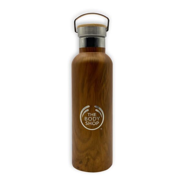 A brown, wood-textured insulated bottle with a silver cap and a metal handle. The Body Shop logo is printed in white on the front.