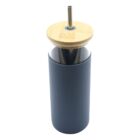 A reusable glass tumbler with a gray silicone sleeve, a bamboo lid, and a metal straw. The tumbler has a sleek, minimalist design.