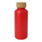 A bright red cylindrical bottle with a smooth surface and a brown cork stopper on top. The bottle is standing upright against a plain white background.
