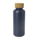 A dark blue, cylindrical bottle with a matte finish and a wide, round cork stopper on top. The bottle has a simple, modern design and is standing upright against a white background.