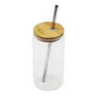 A clear glass tumbler with a bamboo lid and a metal straw inserted through the center. The lid has a smooth, natural finish, and the straw extends into the glass, suitable for beverages. The tumbler is isolated on a white background.