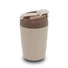 A beige travel mug with a brown lid featuring a flip-top closure. The design is simple and compact, suitable for hot or cold beverages. The mug has a smooth, matte finish and is placed against a plain white background.