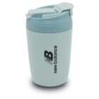 Light blue insulated travel mug with a lid, featuring the New Balance logo and text.
