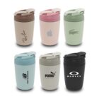Six travel mugs with various logos, each in different colors: brown, pink, green, blue, beige, and black. Logos include brands like Puma and Oakley. Each mug has a flip-top lid.