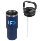 A blue insulated tumbler with IPG logo on the side, shown with a detachable black lid featuring a handle and attached straw beside it, set against a plain white background.