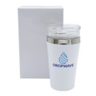 A white insulated tumbler with a clear lid sits in front of a plain white box. The tumbler features a blue logo of a stylized water droplet above the word DROPWAVE.