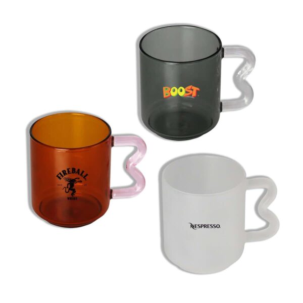 Three glass mugs with heart-shaped handles are displayed: one transparent with BOOST, one amber with FIREBALL WHISKEY, and one solid white with NESPRESSO.