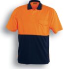 Short-sleeved polo shirt with a bright orange upper section and navy blue lower section. It has a collar with a navy trim and a chest pocket. Text below reads Fluro Orange / Navy.