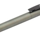 A sleek ballpoint pen with a metallic gray body, featuring a black clip on the cap with the text CARBON COPY in white.