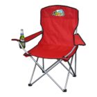 A red foldable camping chair with a black frame featuring a logo on the backrest. One armrest holds a green bottle in a built-in holder.