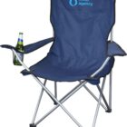 A blue folding chair with a water agency logo on the backrest. It has a drink holder on the right armrest, holding a green bottle. The chair is set against a plain white background.